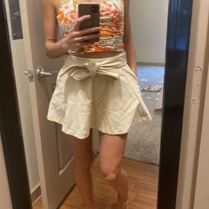 Mini skirt. Size XS. Forever 21. Raw color like cream.